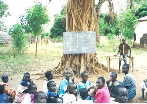 Refugee children in a learning environment